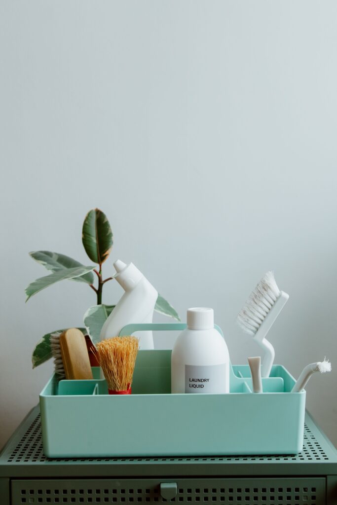 Lazy Susan organizer holding cleaning supplies